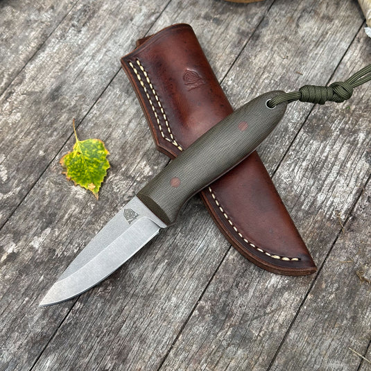 The Campcraft - Sabre Grind/Green Canvas Micarta