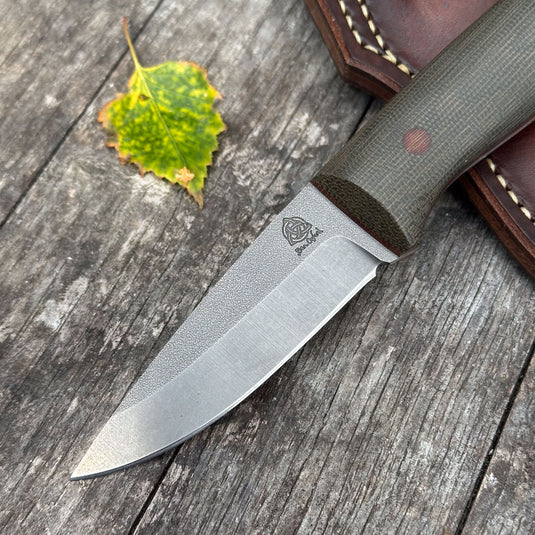 The Campcraft - Sabre Grind/Green Canvas Micarta
