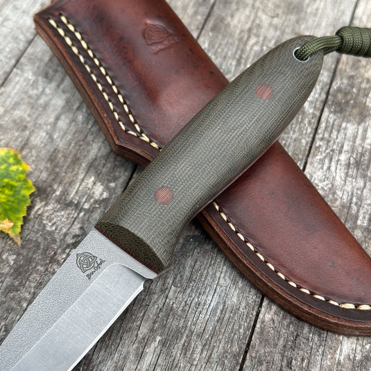 The Campcraft - Sabre Grind/Green Canvas Micarta