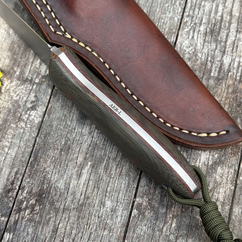 Load image into Gallery viewer, The Campcraft - Sabre Grind/Green Canvas Micarta