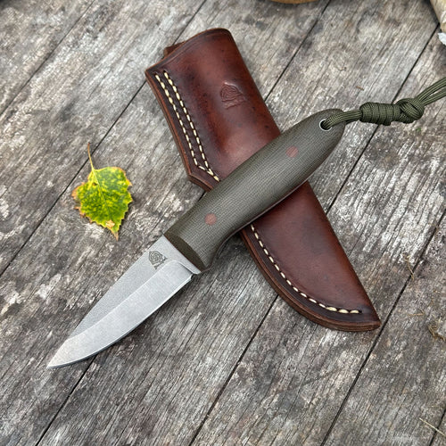 The Campcraft - Sabre Grind/Green Canvas Micarta